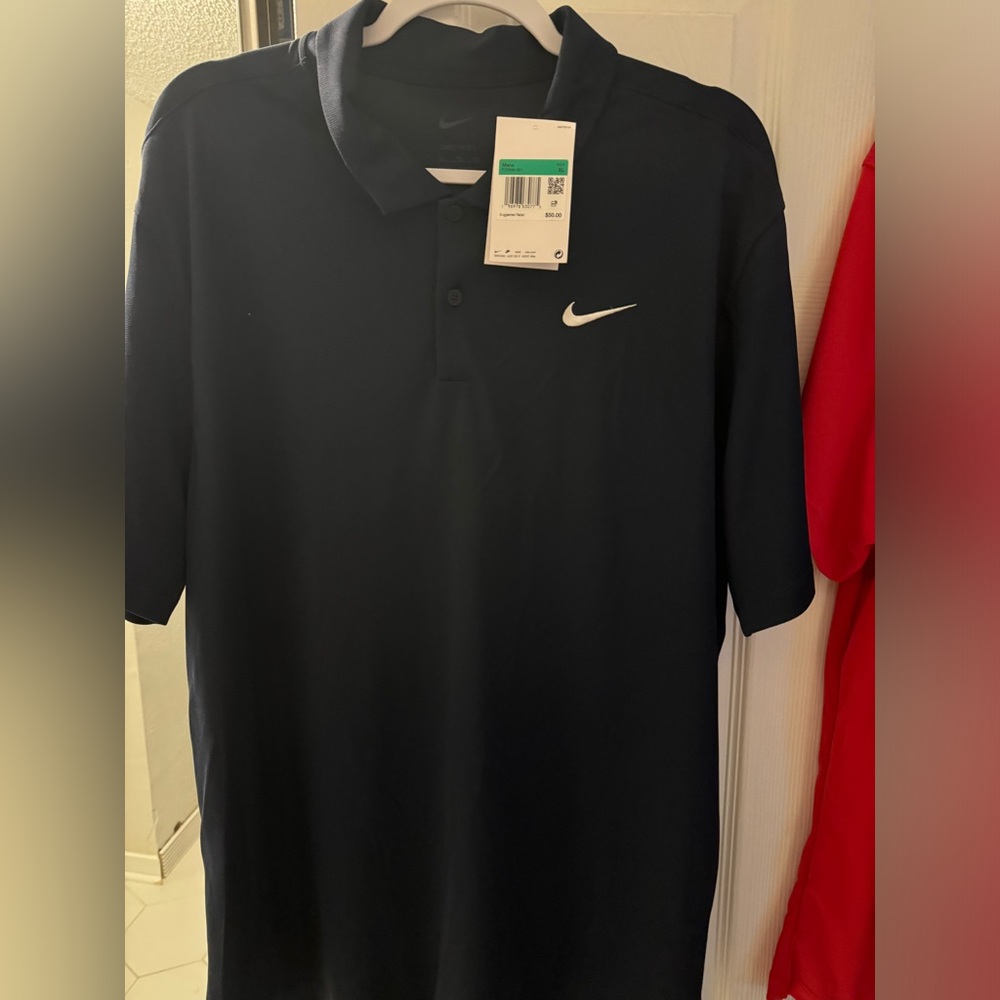 Nike golf polo brand new size XL (Navy)